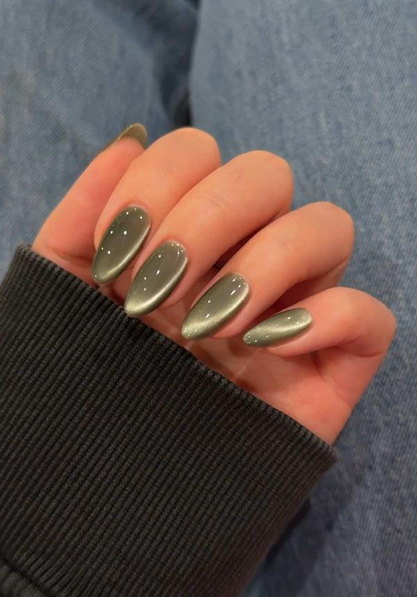 Mẫu nail mắt mèo màu xanh hot 2023