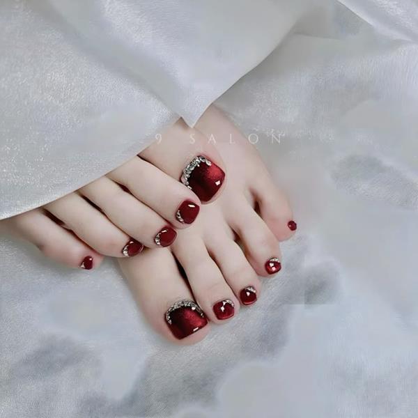 Nail chân mắt mèo màu đỏ đính đá